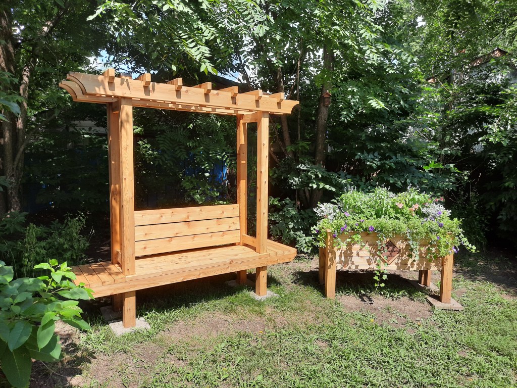 Custom wood garden decor. Bench and planter.
