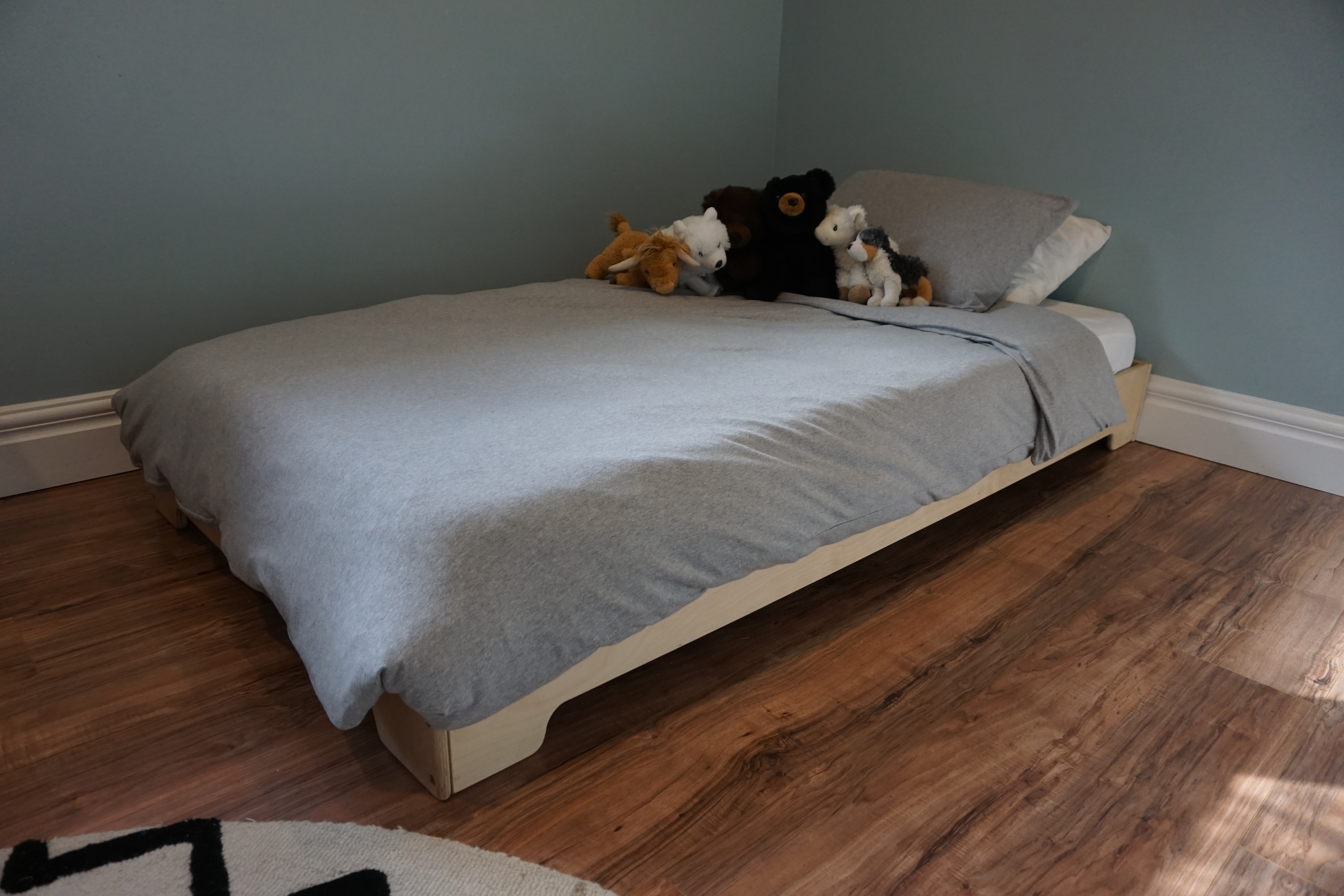 Custom made sensory table and a Montessori bed.